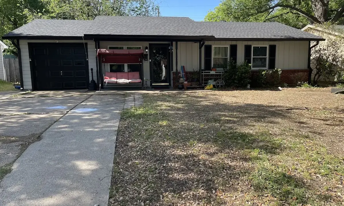 Asphalt Shingle Roof Repair crew at work on a residential roof in Ocean Springs
